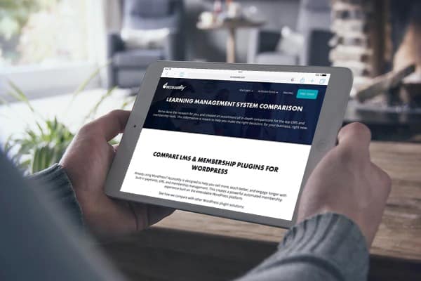 ipad showing a website with LMS comparisons