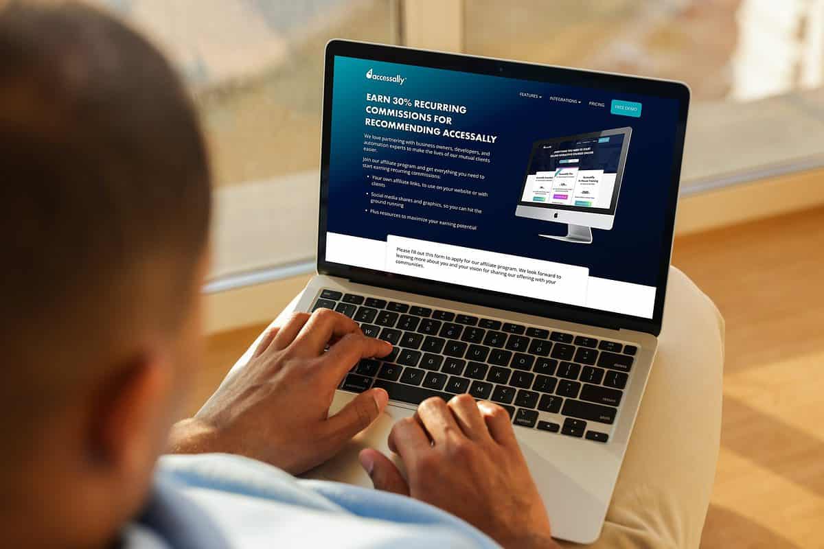 laptop displaying the AccessAlly affiliate program signup page