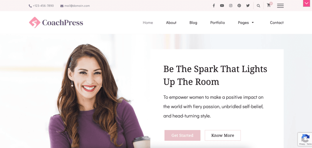 CoachPress Lite feminine WordPress demo site, with white and pink accents
